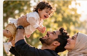 Parent lifting a toddler during an outdoor family session
